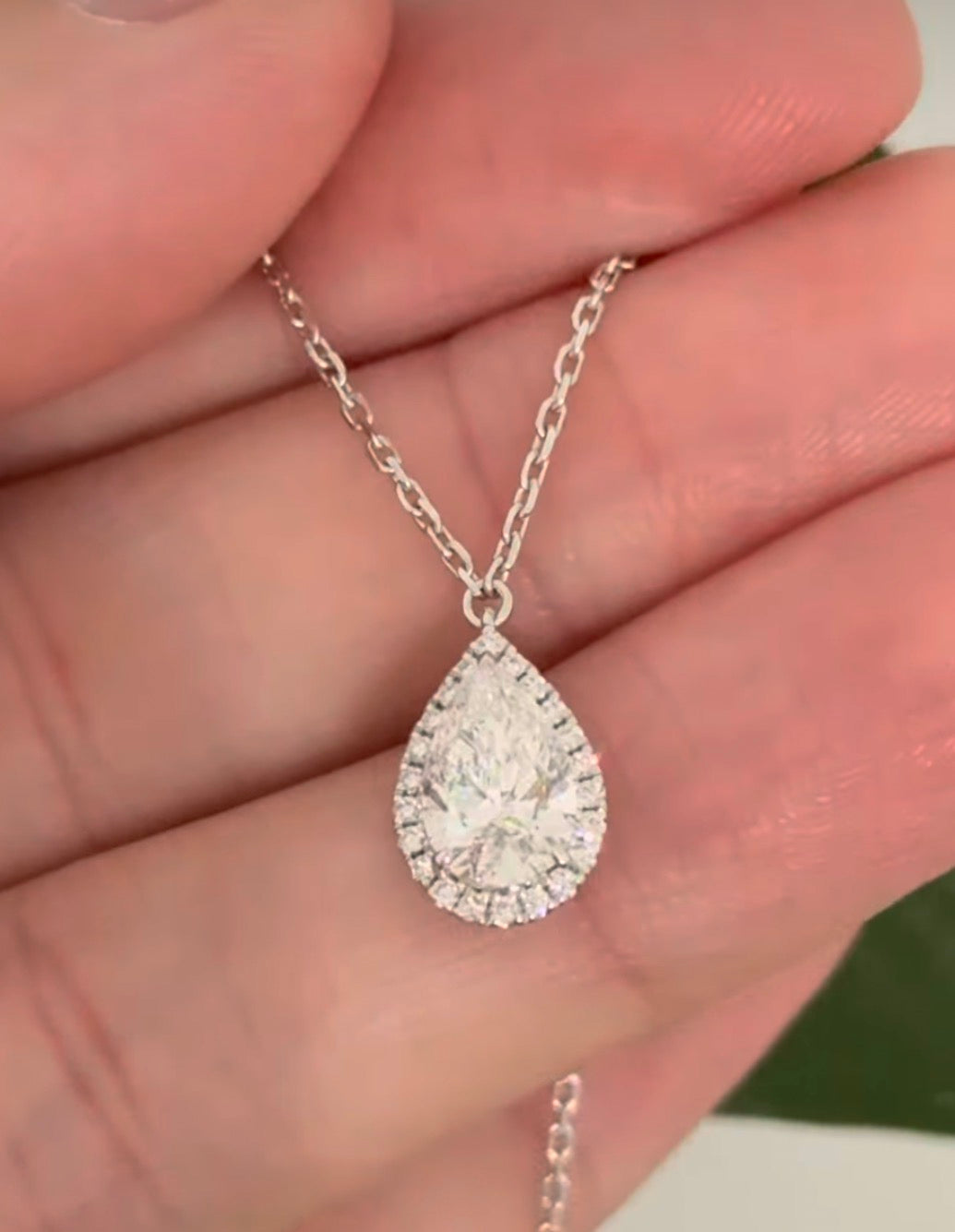 White gold pear shaped lab diamond necklace. Center stone is 1.07cts and measures 8.6x5.2mm.  Chain is 16” with an adjustment of 4” to make as long as 20”.