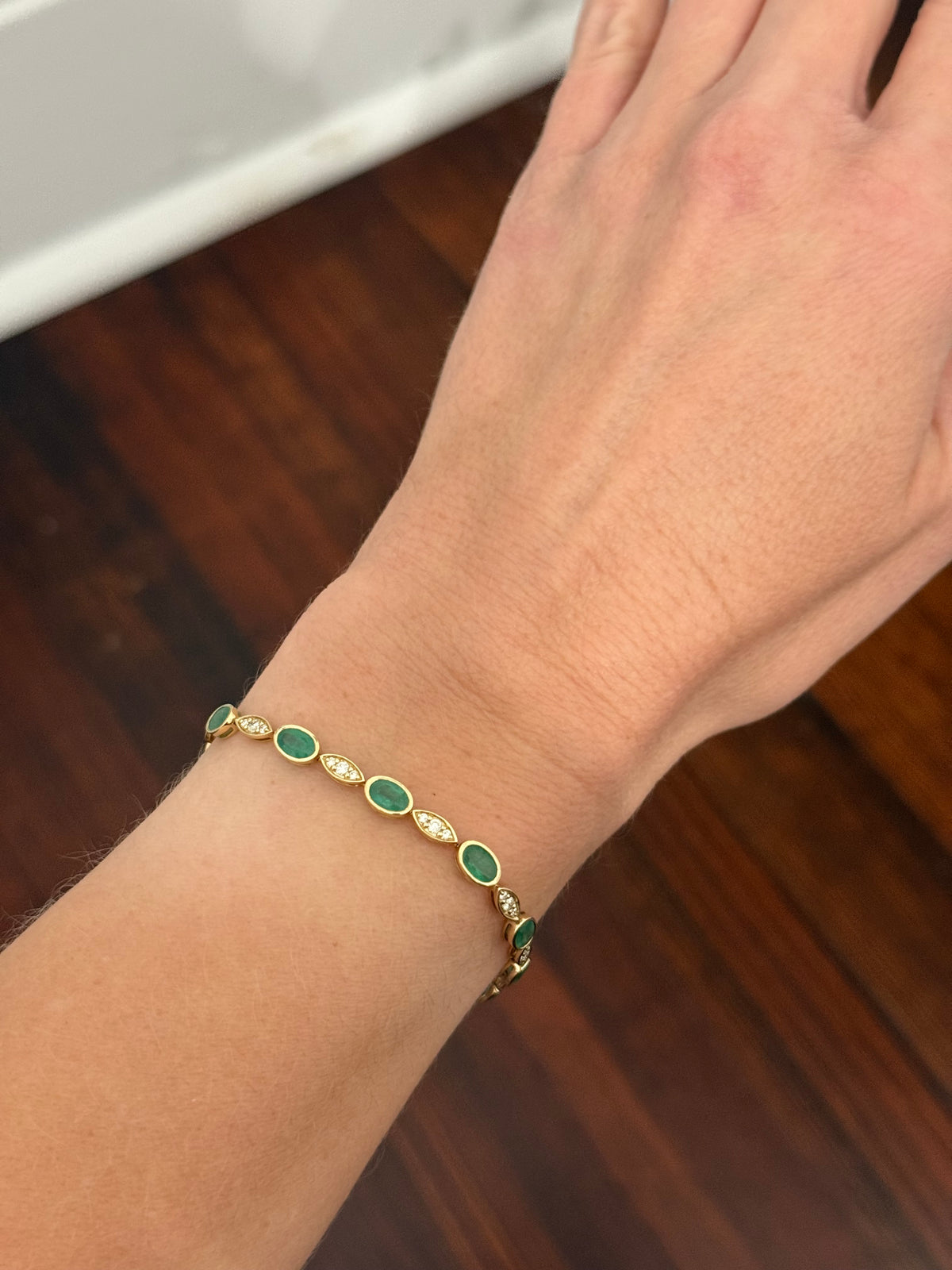Yellow gold natural emerald and diamond bracelet