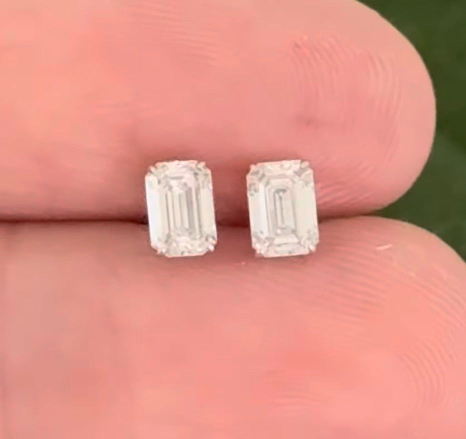 White gold 0.70ct emerald cut lab diamond stud earrings with screw backs