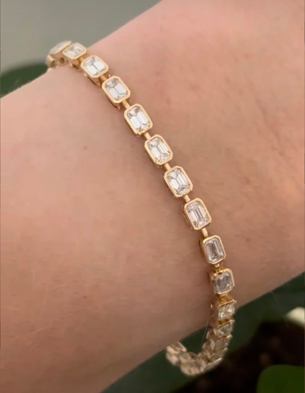 Yellow gold bezel set 5.71ct emerald cut natural diamond bracelet