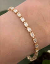 Yellow gold bezel set 5.71ct emerald cut natural diamond bracelet