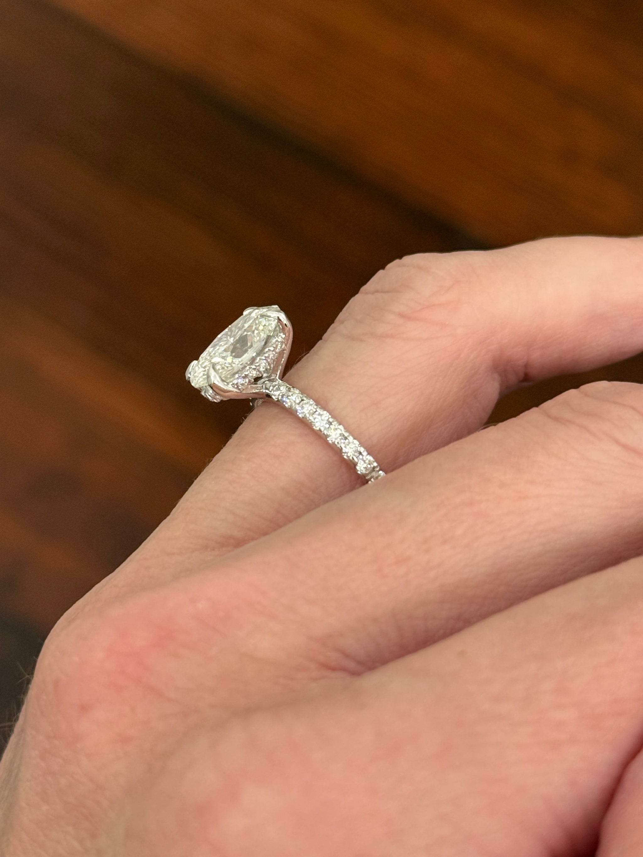 White gold oval lab diamond ring. Center stone is IGI certified and 3.03cts E VVS2