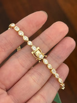Yellow gold bezel set 5.35ct oval, marquise, pear shape and emerald cut natural diamond bracelet