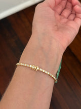 Yellow gold bezel set 3.81ct emerald cut and round natural diamond bracelet