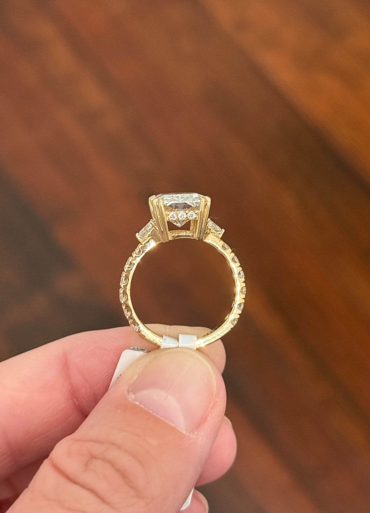 IGI certified radiant and trillion and round lab diamond ring. Center stone is 5.44cts