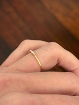 Yellow gold tapered baguette natural diamond band