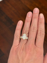 Yellow gold oval and round lab diamond ring and band set. Center stone is 5.1cts