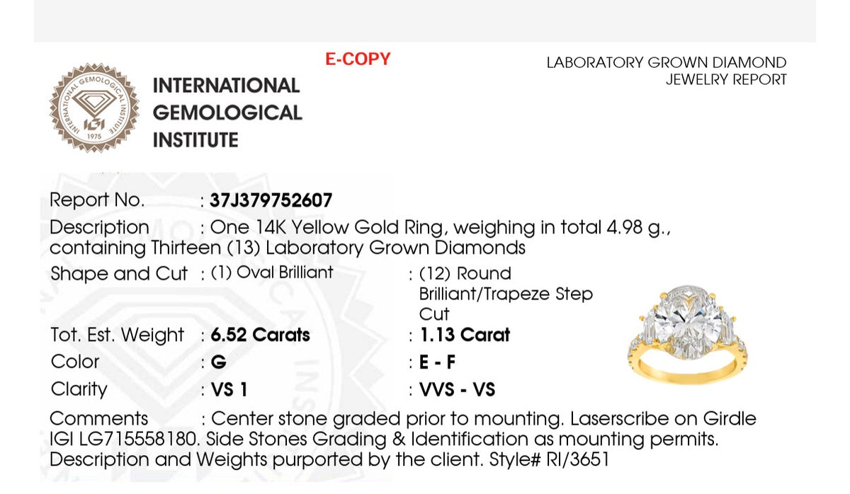 IGI certified oval and trapezoid and round lab diamond ring. Center stone is 6.52cts
