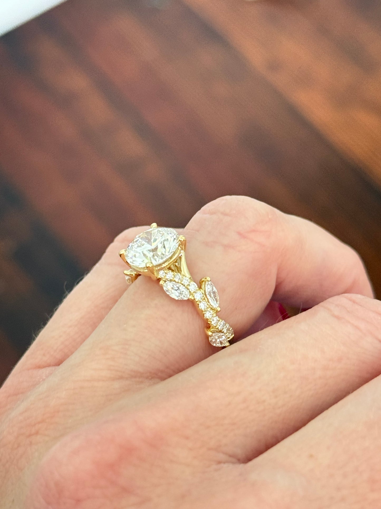 Yellow gold round and marquise lab diamond ring. Center stone is 3.05cts