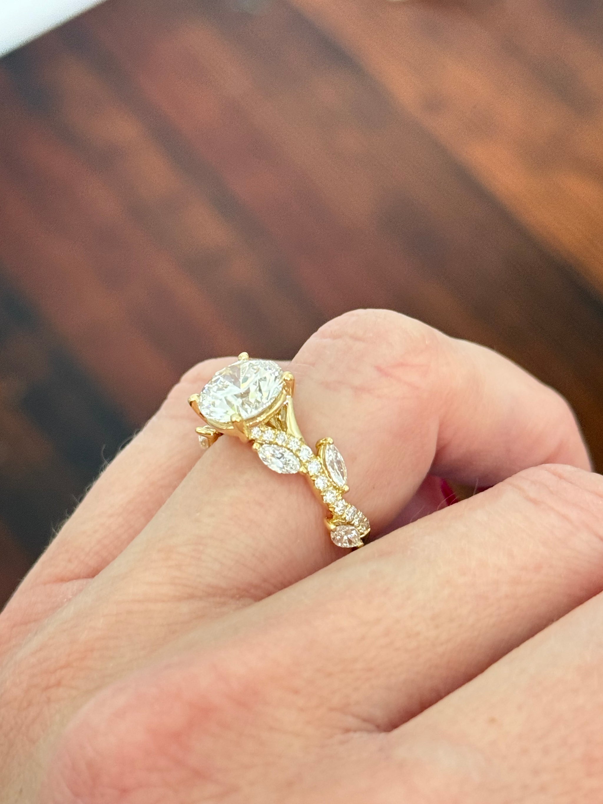 Yellow gold round and marquise lab diamond ring. Center stone is 3.05cts