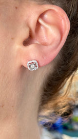 Diamond stud earrings available in yellow and white gold