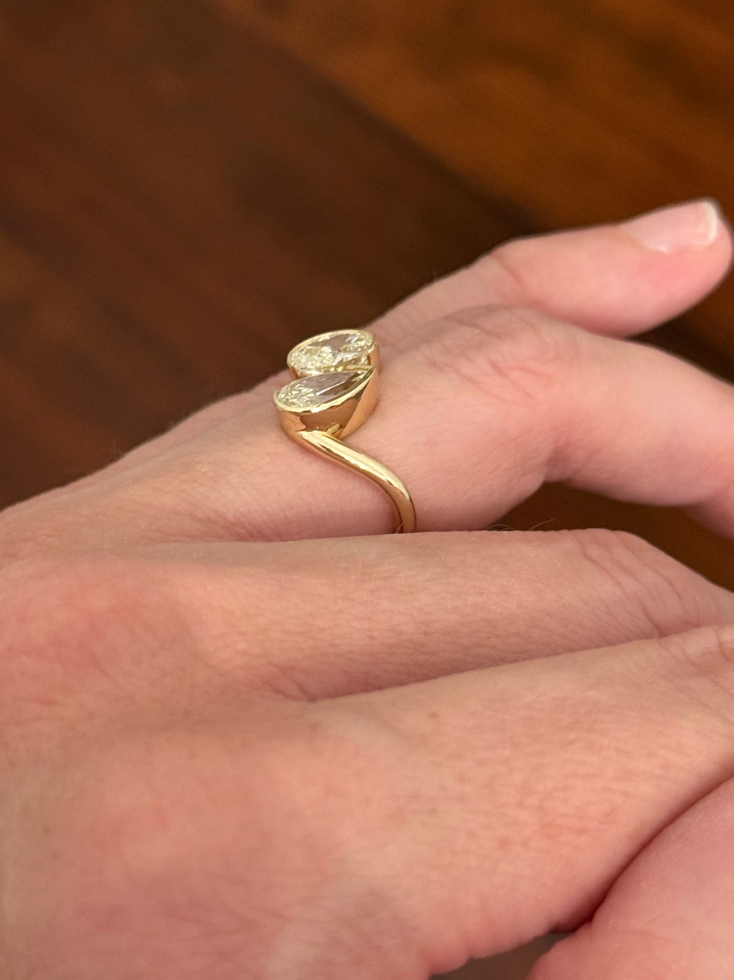 Yellow gold oval and pear shape lab diamond ring
