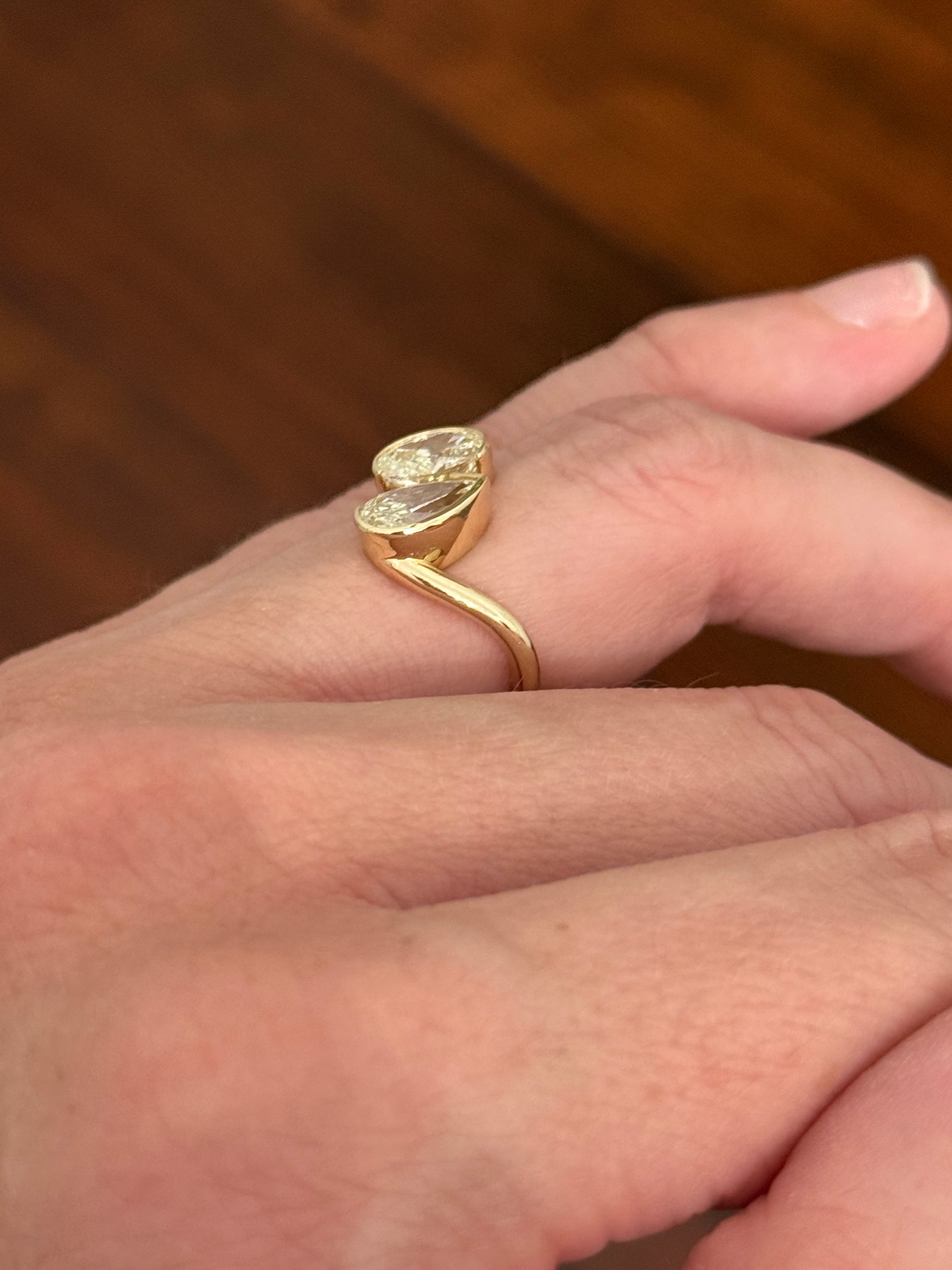 Yellow gold oval and pear shape lab diamond ring