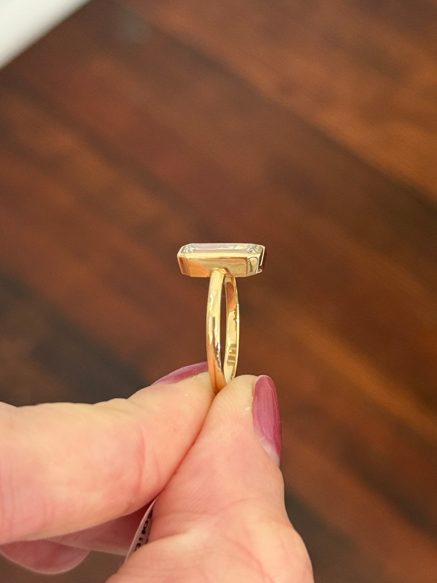 Yellow gold bezel set baguette lab diamond ring
