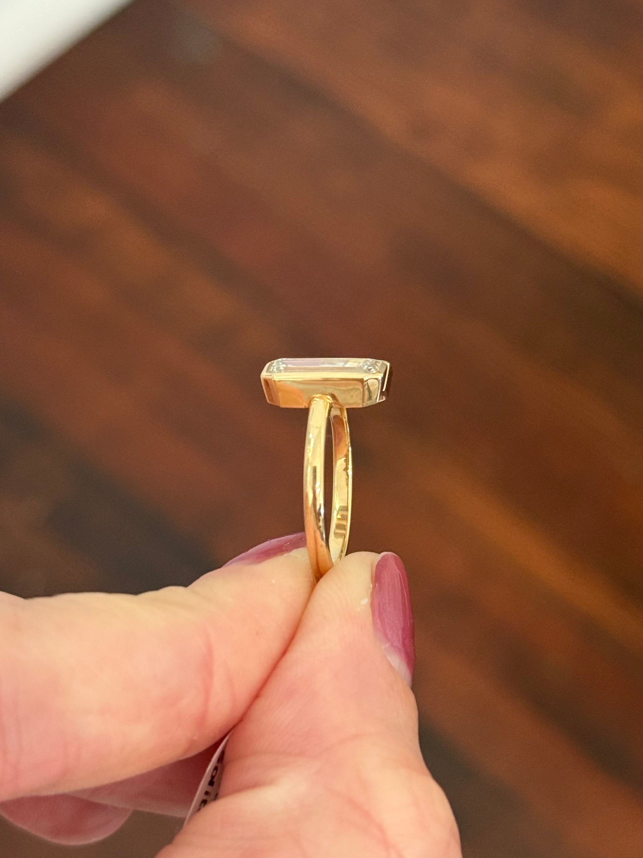 Yellow gold bezel set baguette lab diamond ring