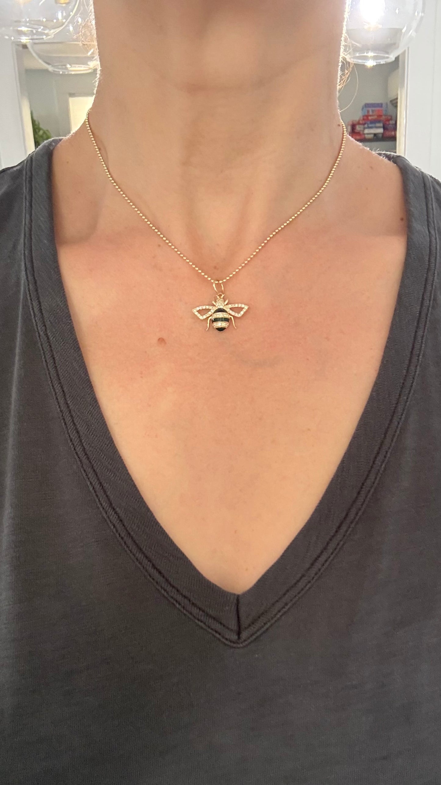 Yellow gold natural diamond and black enamel pendant