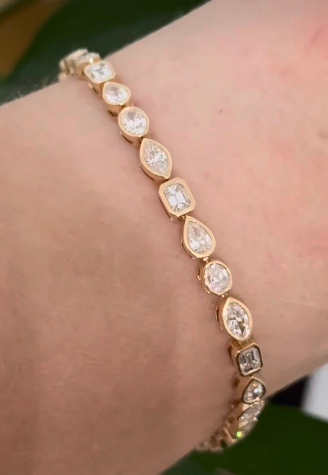 Yellow gold bezel set 5.22ct oval, marquise, pear shape and emerald cut natural diamond bracelet