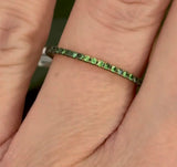 Yellow gold tsavorite eternity band