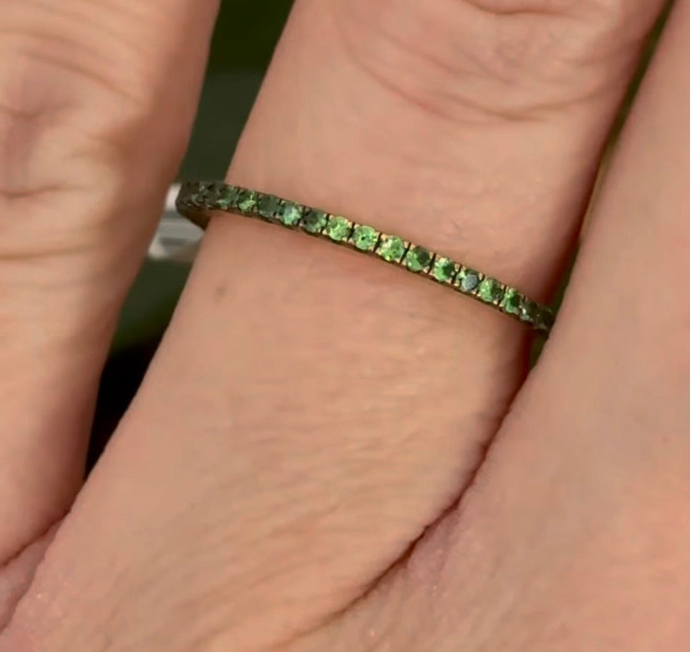 Yellow gold tsavorite eternity band