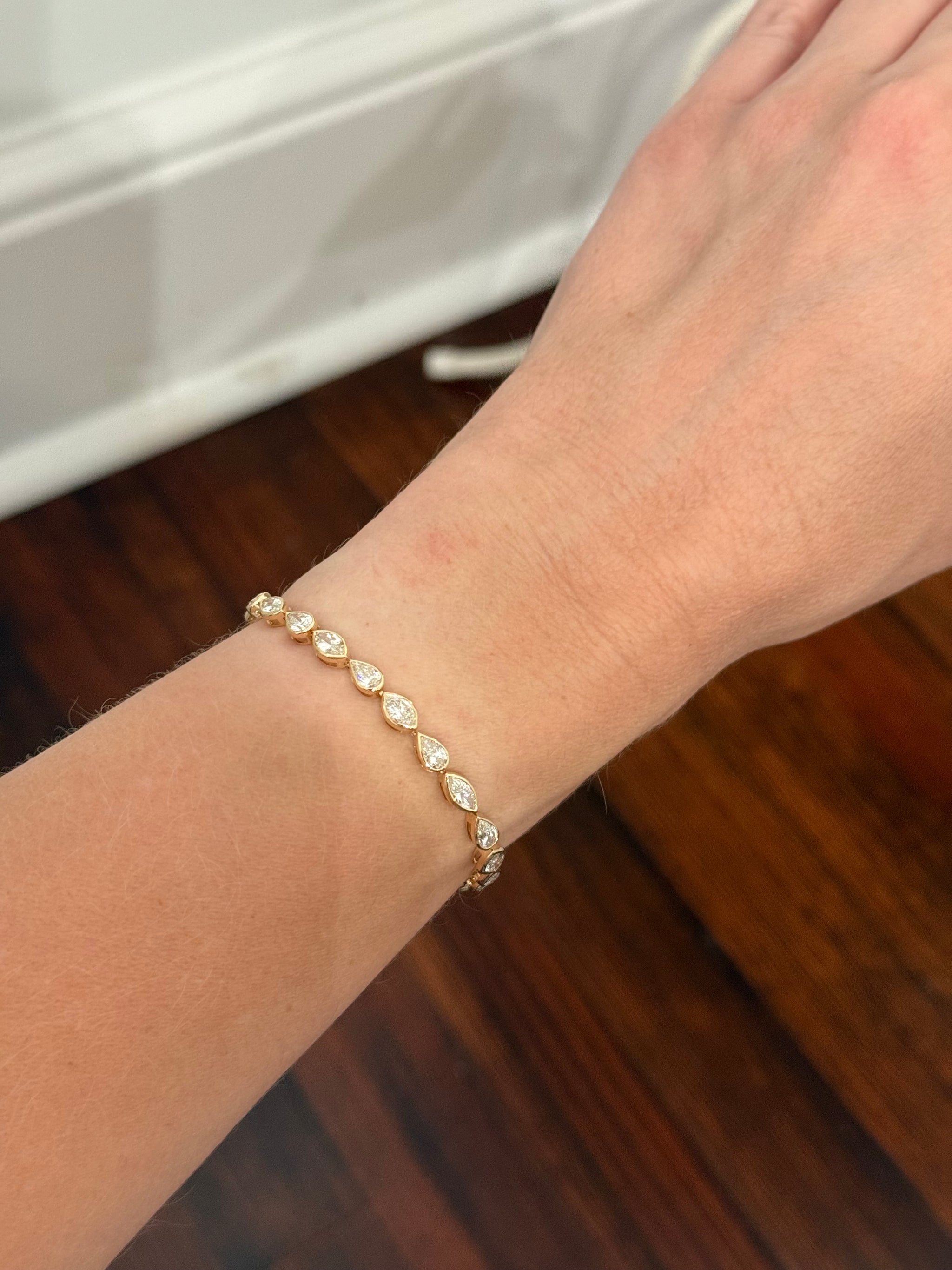 Yellow gold bezel set 6.4ct marquise and pear shape natural diamond bracelet