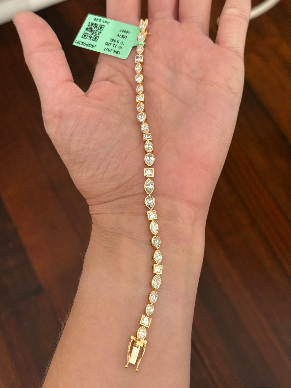 Yellow gold bezel set 8.49ct marquise, pear shape and princess cut natural diamond bracelet