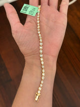 Yellow gold bezel set 8.49ct marquise, pear shape and princess cut natural diamond bracelet