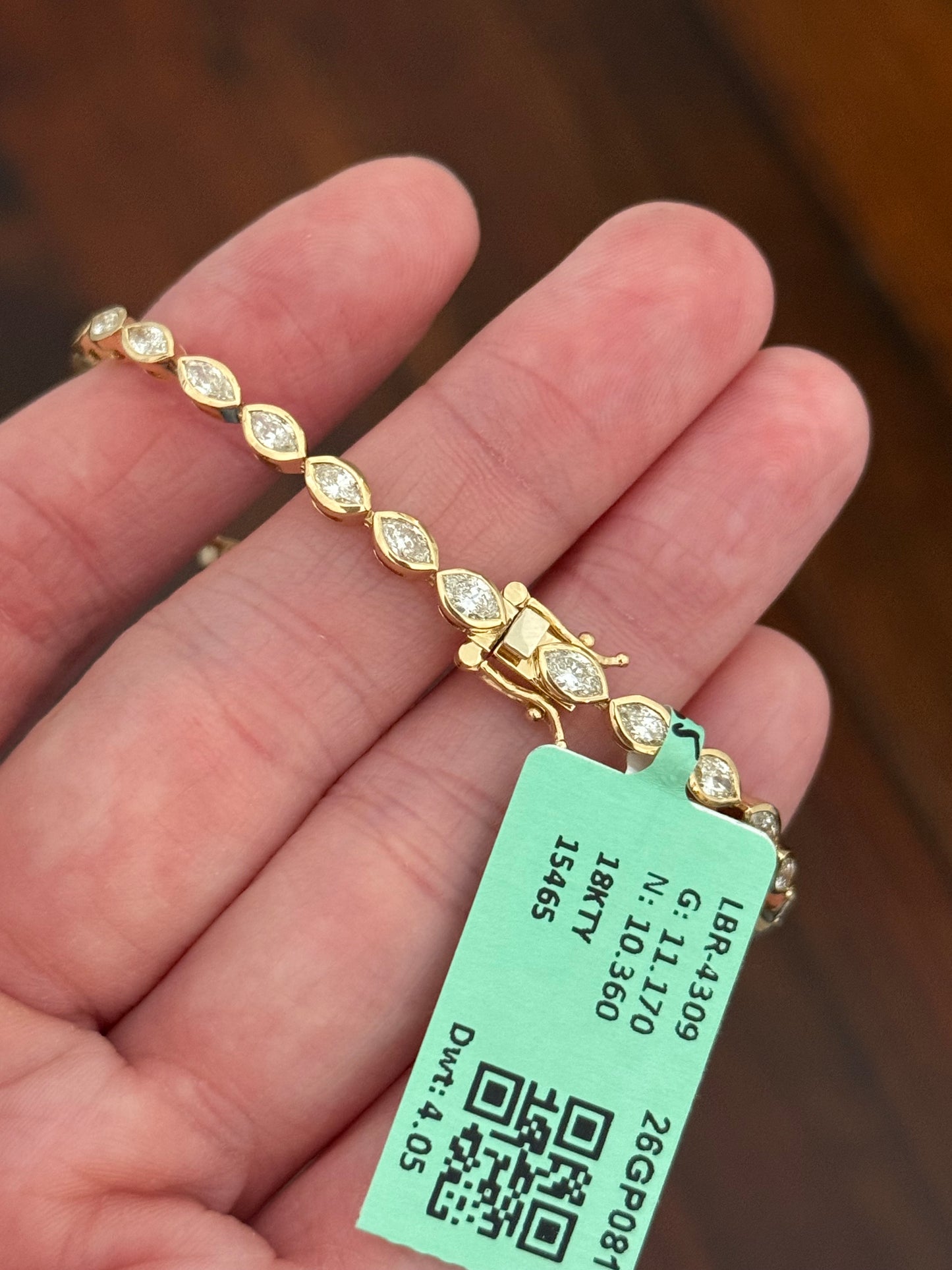 Yellow gold bezel set 4.05ct marquise natural diamond bracelet