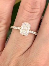 IGI certified yellow gold emerald cut and round lab diamond ring. Center stone is 1.86cts