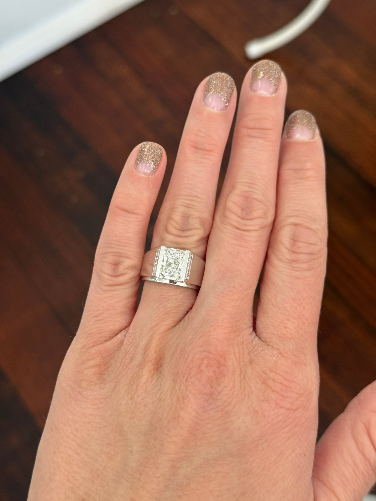 White gold men’s size 7 radiant and round lab diamond ring