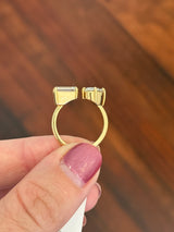 Yellow gold emerald cut and oval lab diamond toi et moi ring