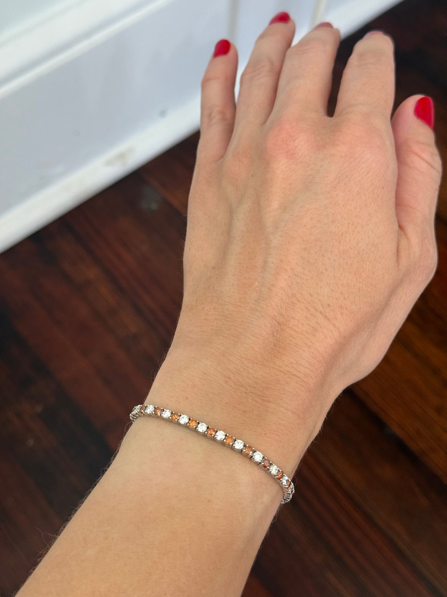 4 prong white gold 4.99ct orange and white lab diamond tennis bracelet