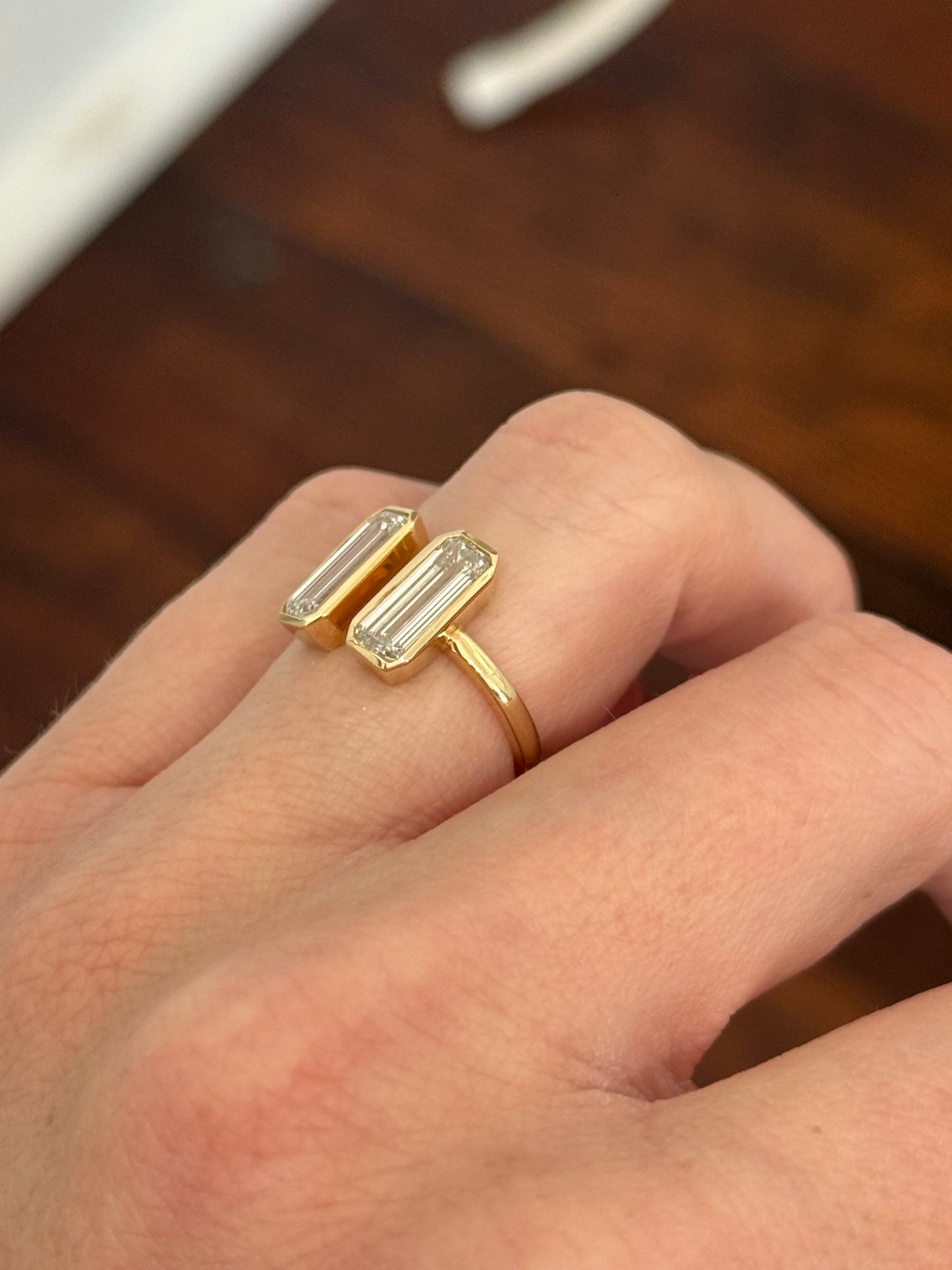 Yellow gold bezel set baguette lab diamond ring