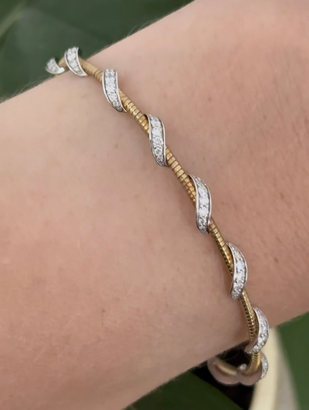 Yellow gold lab diamond flex bracelet. Lab diamonds are set in white gold.