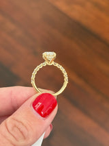 Yellow gold oval lab diamond ring. Center stone is IGI certified and 3.06cts E VVS2