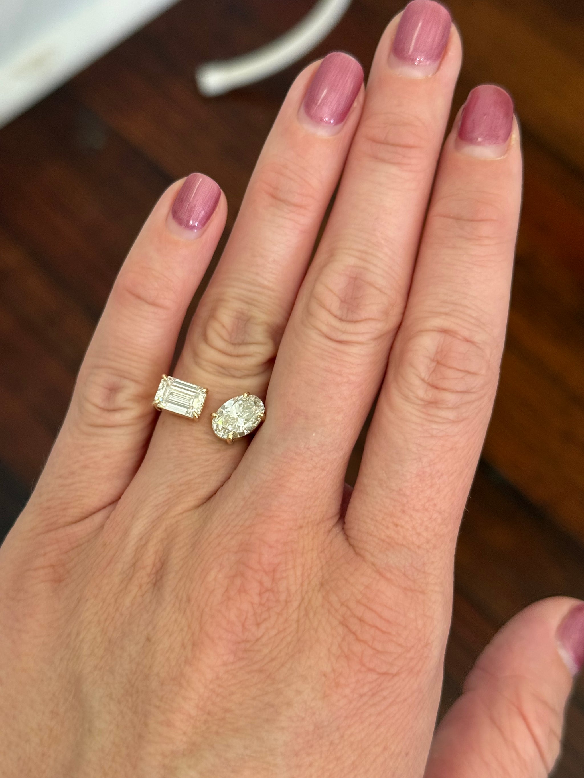 Yellow gold emerald cut and oval lab diamond toi et moi ring
