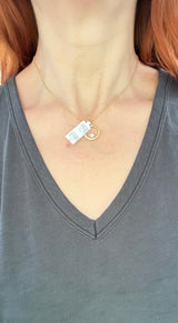 Yellow gold lab diamond pendant. Lab diamonds are set in white gold