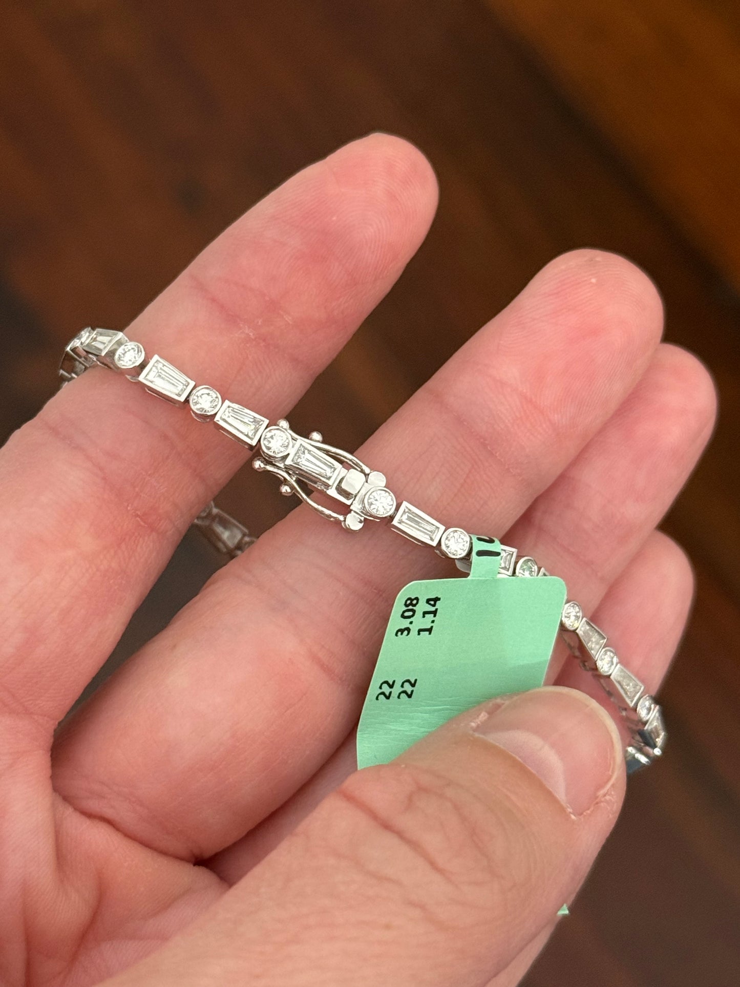 White gold bezel set 4.22ct tapered baguette and round natural diamond bracelet