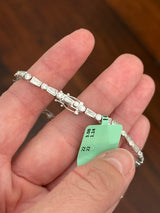 White gold bezel set 4.22ct tapered baguette and round natural diamond bracelet