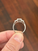 White gold IGI certified 3.04ct emerald cut lab diamond and trapezoid lab diamond ring. Emerald cut measures 10.12x6.70x4.46mm