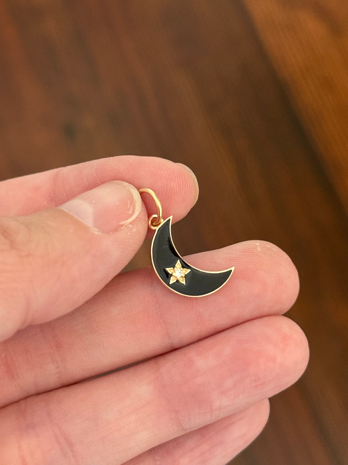 Yellow gold natural diamond and black enamel crescent pendant