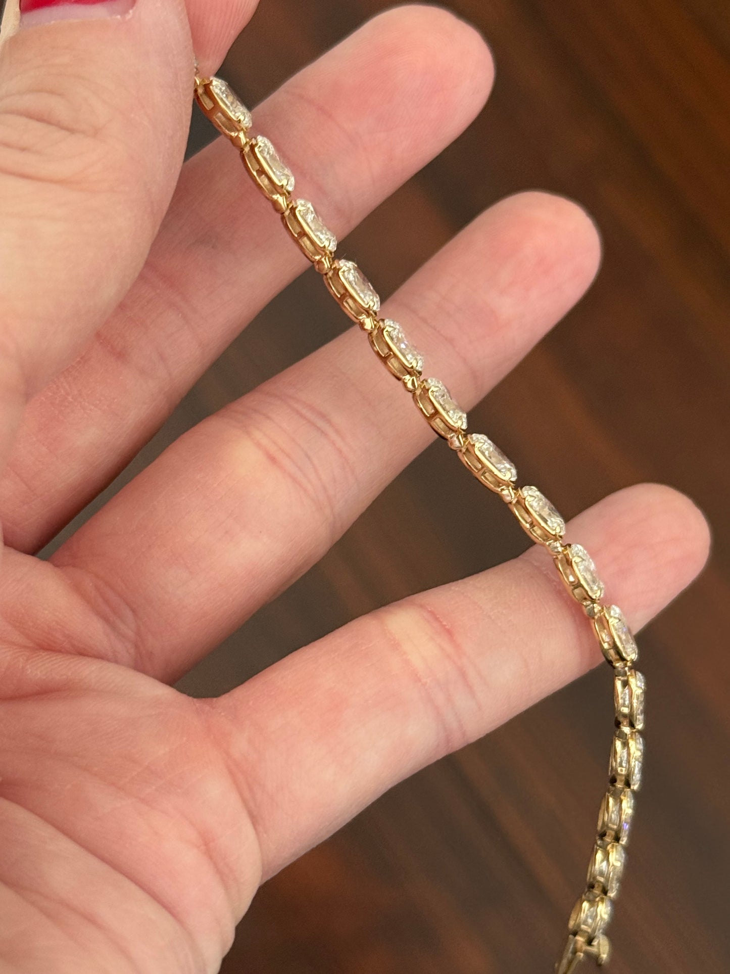 Yellow gold east west set 10.03ct oval lab diamond bracelet