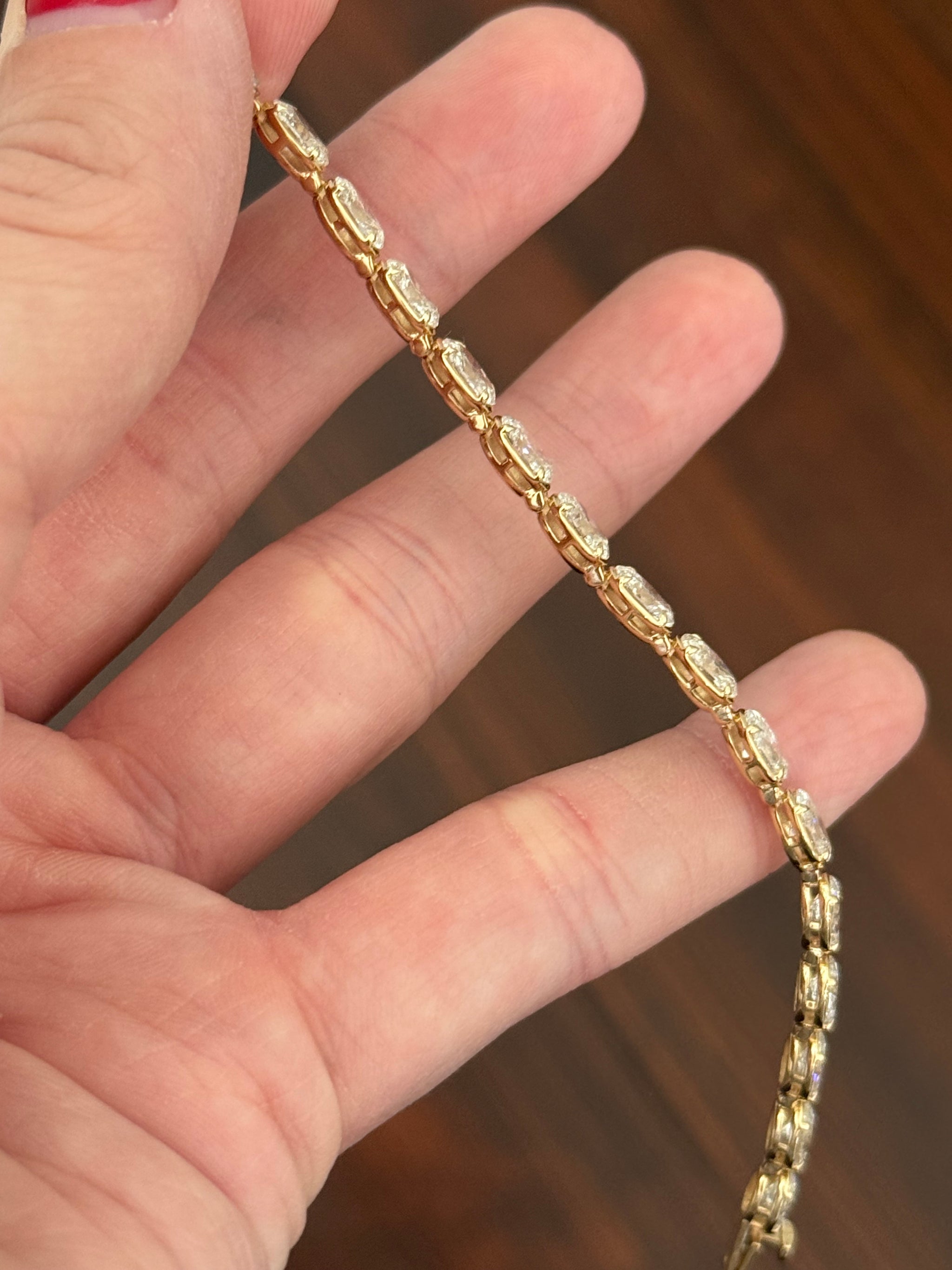 Yellow gold east west set 10.03ct oval lab diamond bracelet