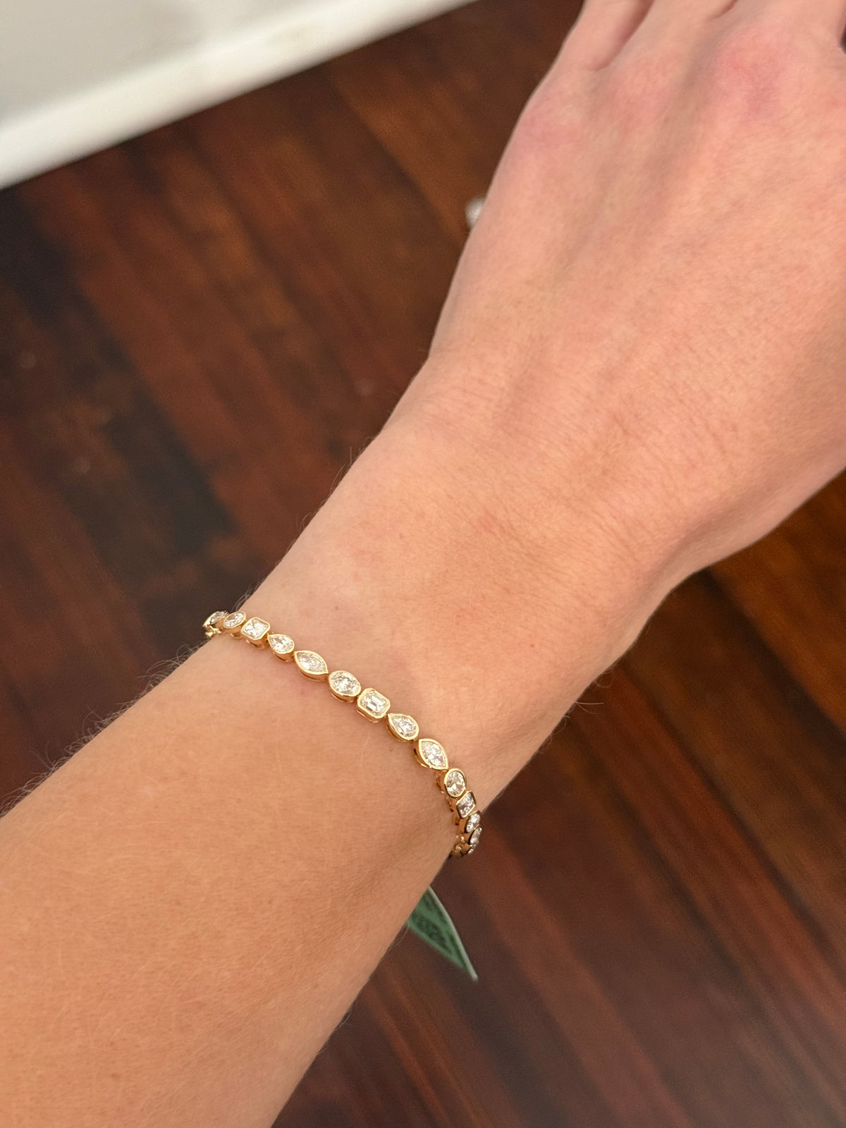 Yellow gold bezel set 5.35ct oval, marquise, pear shape and emerald cut natural diamond bracelet