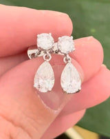 IGI certified 3ct pear and round lab diamond earrings
