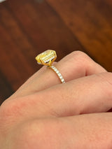 Yellow gold elongated cushion cut yellow lab diamond and white lab diamond ring