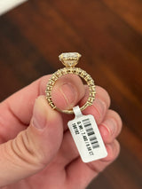 Yellow gold oval and round lab diamond ring and band set. Center stone is 6.58cts
