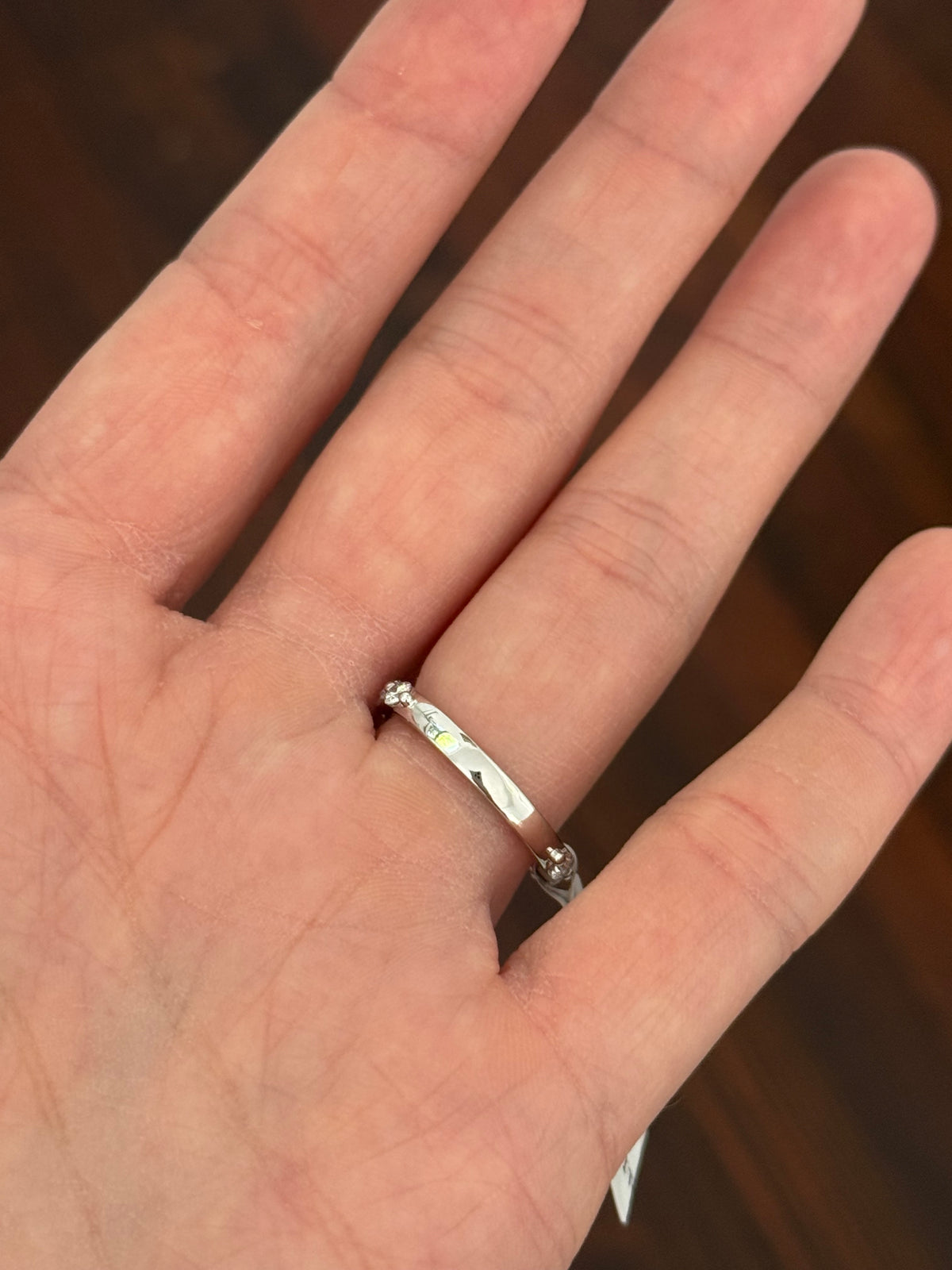 White gold marquise and round lab diamond ring. Center stone is 0.9cts and approximately 10x4.5mn