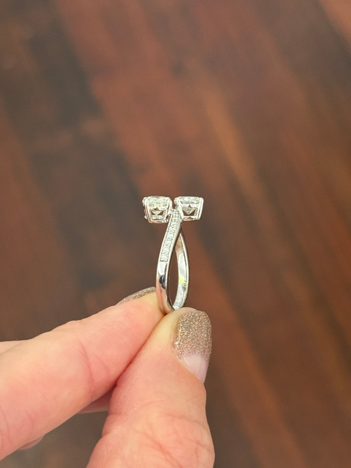 White gold oval and round lab diamond ring. Ovals are approximately 1ct each and 7.6x5mm