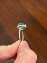 White gold heart shaped lab emerald and round lab diamond ring. Center stone is 2.32cts