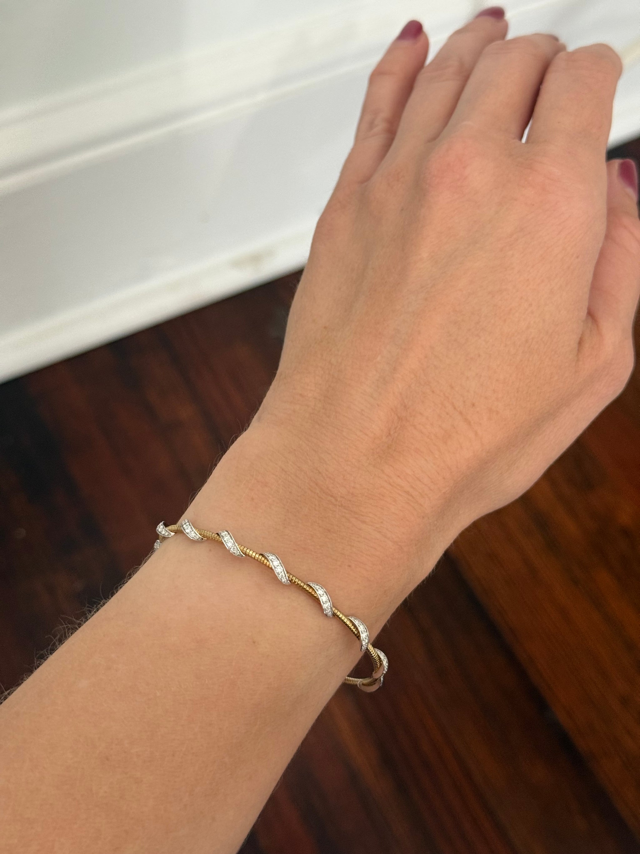 Yellow gold lab diamond flex bracelet. Lab diamonds are set in white gold.